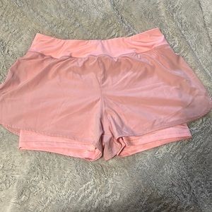 Size XL pink shorts with spandex shorts underneath. Work a few times
